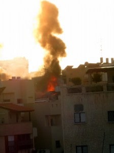 Gas canister burning on roof