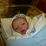 baby boy in bassinet