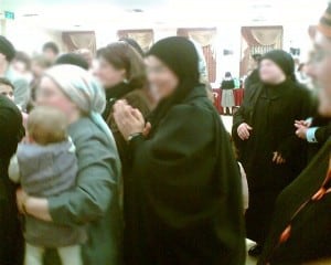 woman at Jerusalem wedding wears shal (cloak)