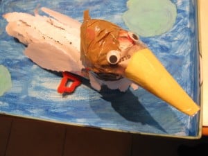 Duck from newspaper, tape and construction paper.