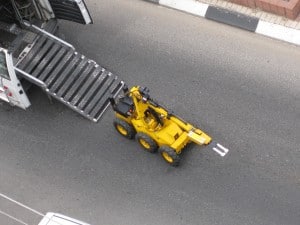 robot exiting van