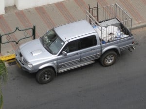 jeep with suspicious sacks in back.