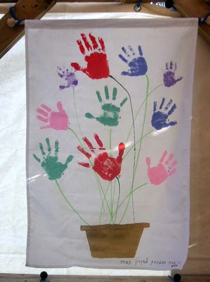 children's handprint as sukkah decoration